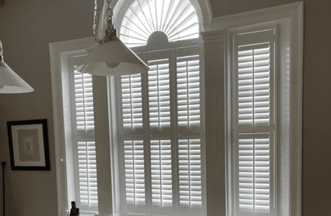 Arched wooden shutters