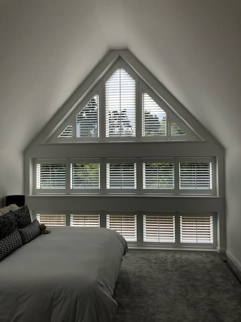 Loft triangle window shutters