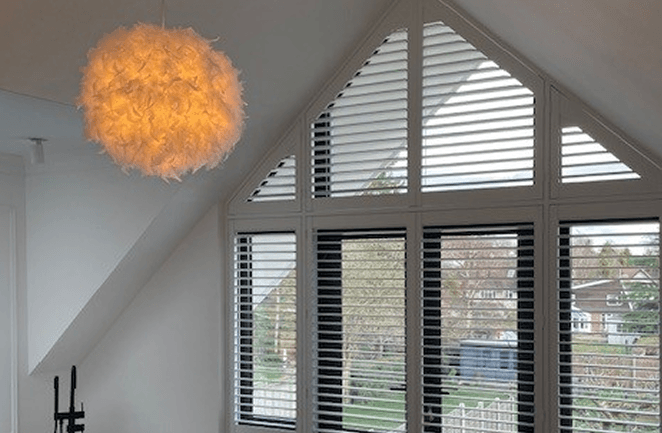 Plantation shutters for apex windows